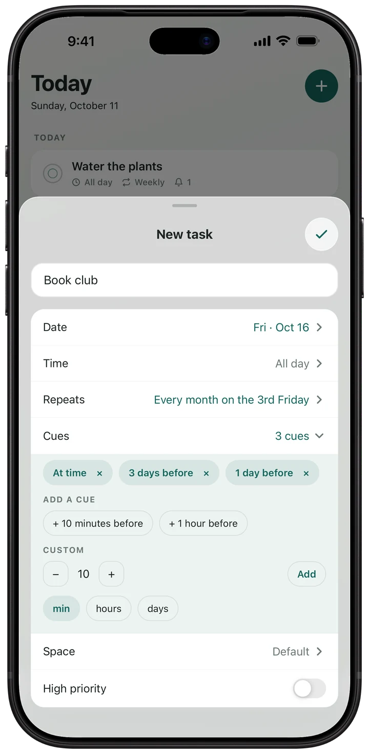 The CueSpace New task sheet for Book club with Cues open: three cues on one task — at the time, 3 days before and 1 day before — with more Add a cue choices and a custom lead below